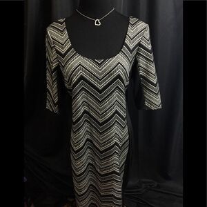 Beautiful flattering dress by Olivia Matthews